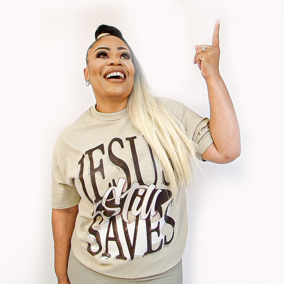 "Jesus still saves" Brown tee