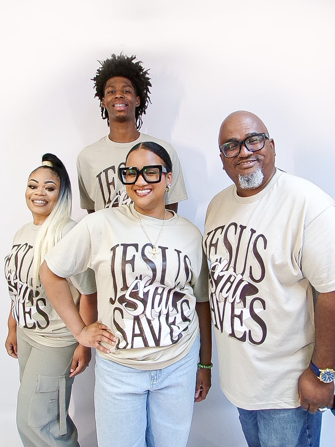 "Jesus still saves" Brown tee